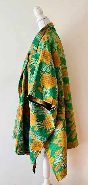 Fully Reversible Blanket Coat Is Bold In Green and Orange