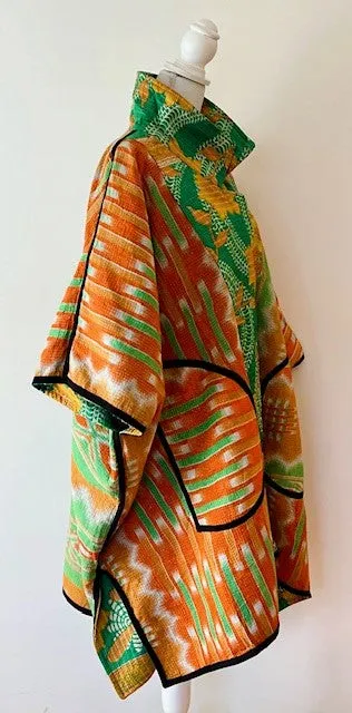 Fully Reversible Blanket Coat Is Bold In Green and Orange